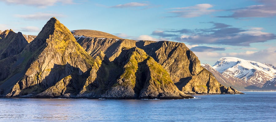 Discover the rugged coastline of Northern Norway during a guided tour.